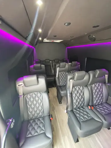Executive Sprinter quilted seats beside the center aisle — Point-to-Point Sprinter Van Transfers