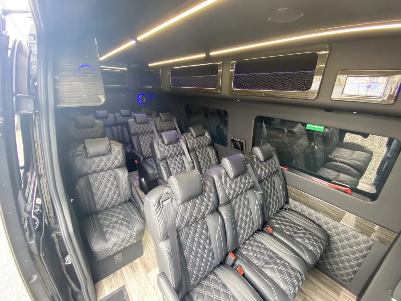 Executive Sprinter quilted seats viewed through the side doorway — Ronald Reagan Washington National Airport